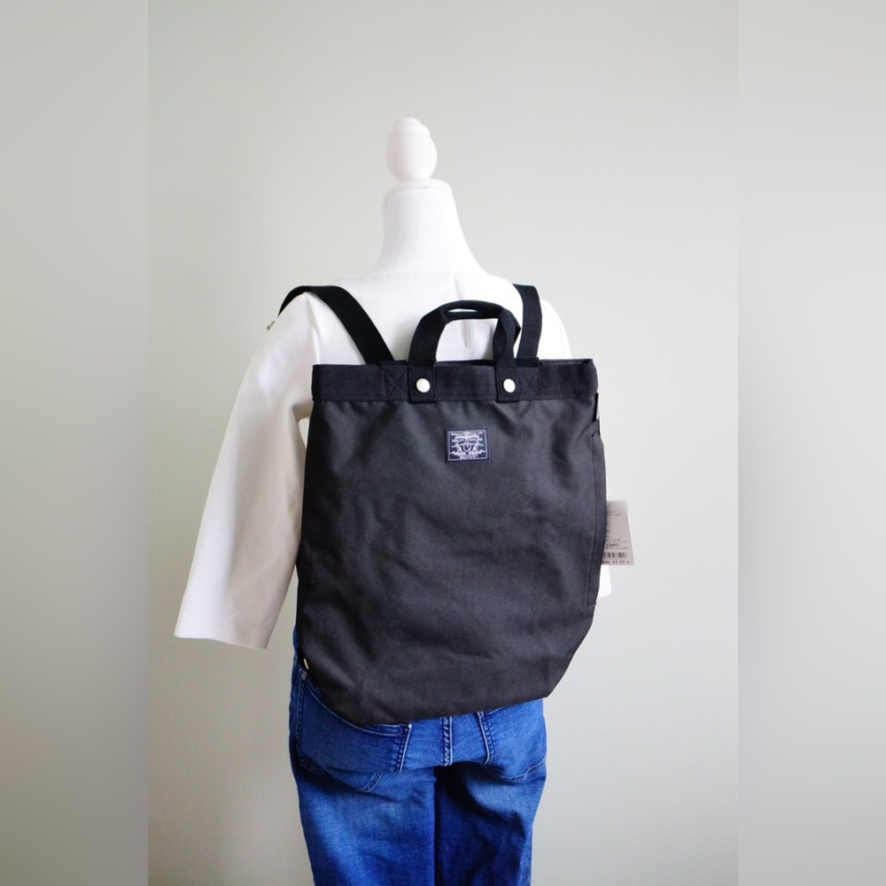 BNWT Rootote black backpack